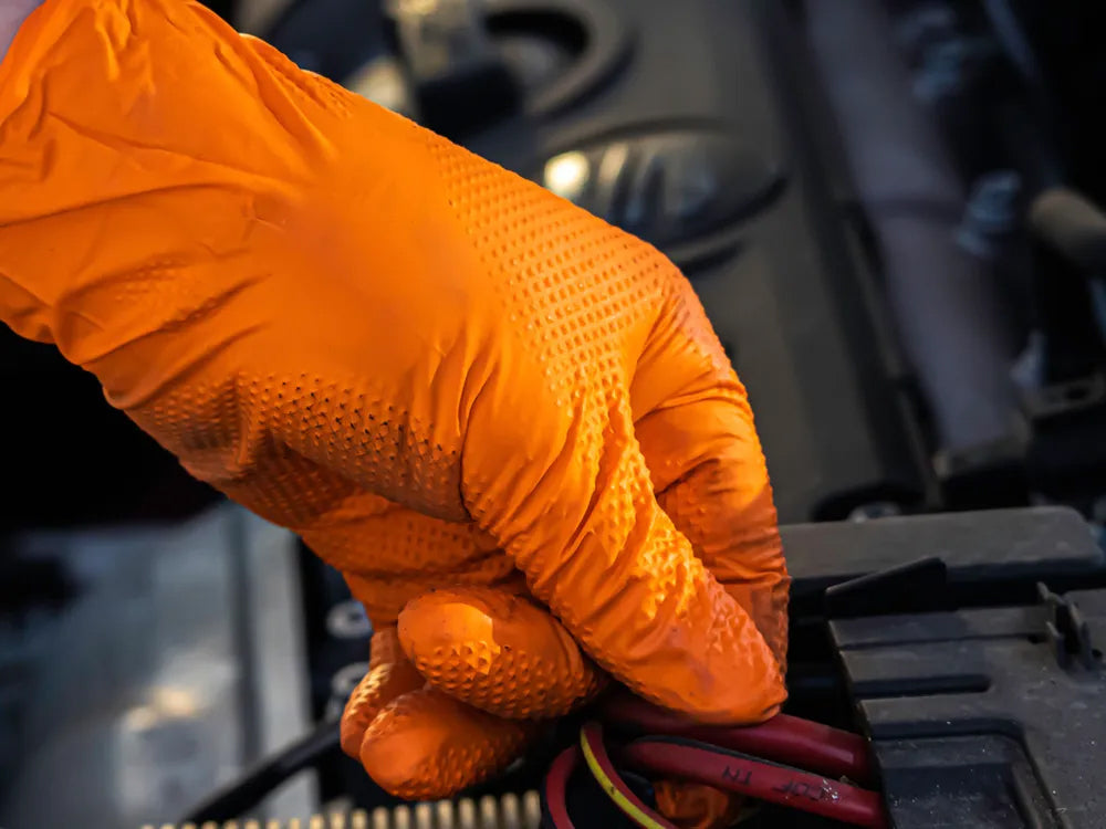 Close up of hand wearing Mechanic Nitrile Gloves