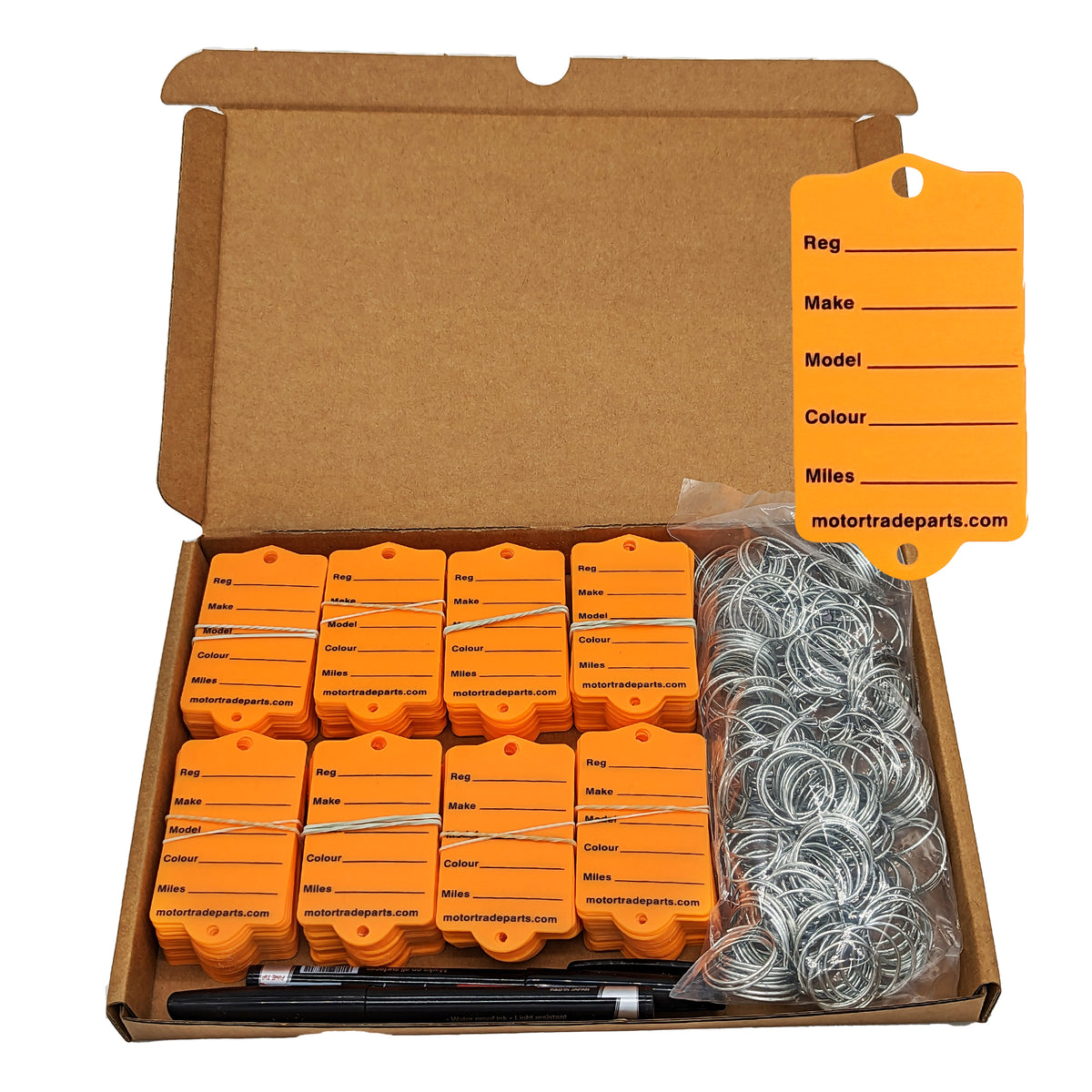 Car Key Tags in a box. These are Orange tags.